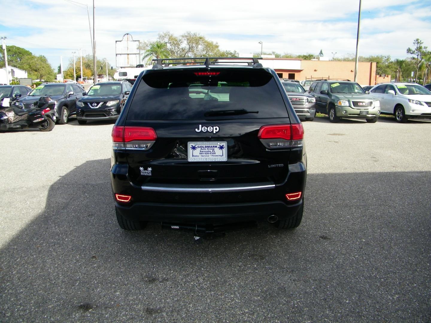 2017 Black /Black Jeep Grand Cherokee Limited (1C4RJEBG4HC) with an 3.6L V6 engine, Automatic transmission, located at 4000 Bee Ridge Road, Sarasota, FL, 34233, (941) 926-0300, 27.298664, -82.489151 - Photo#4